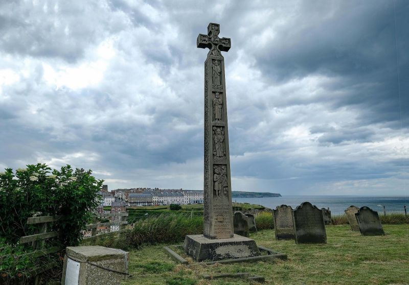 Caedmon's Cross at the top of the steps remembers the Anglo-Saxon poet